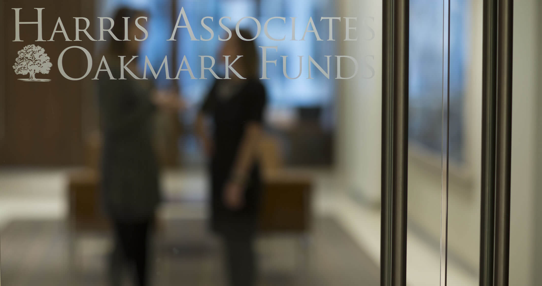 Harris-Oakmark lobby with women in a discussion